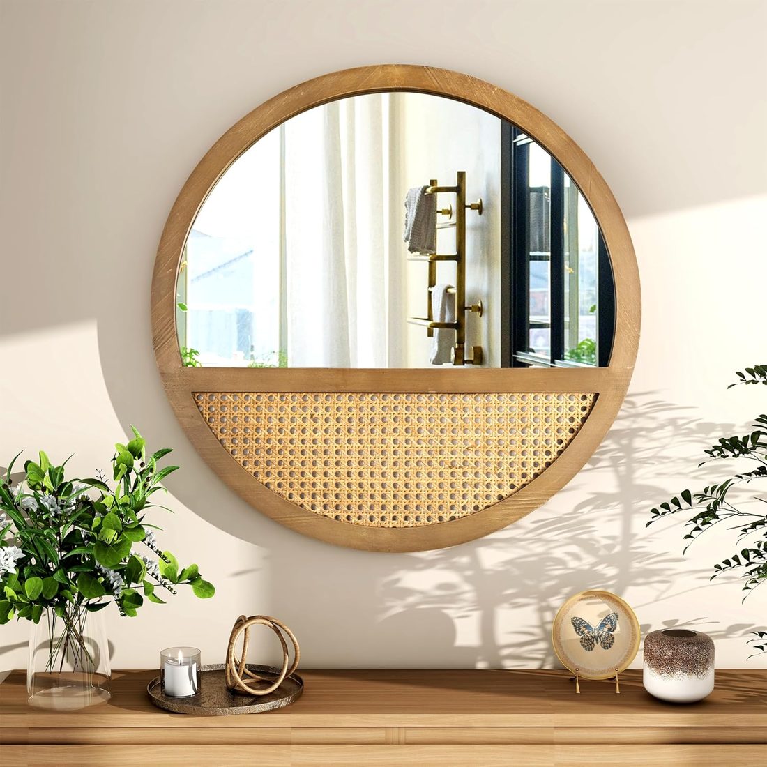 Round wall mirror with a wood frame and a woven rattan cane panel